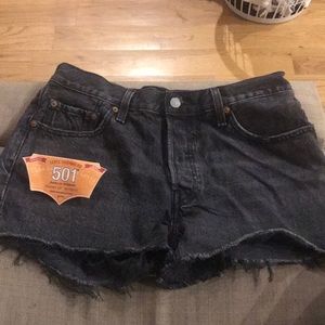 Levi’s 501 black distressed denim shorts